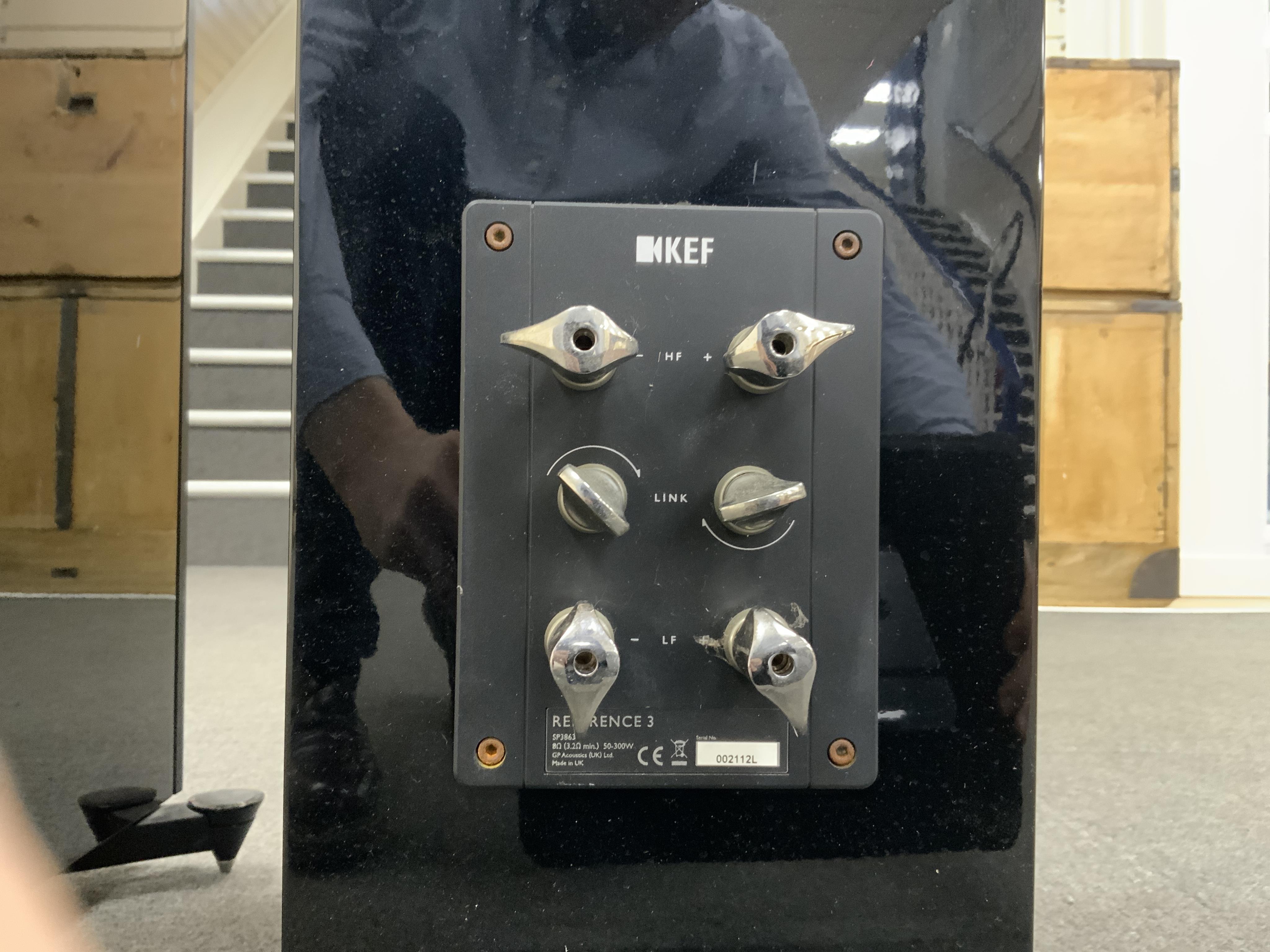 A pair of flooring standing limited edition KEF Reference 3 stereo speakers, the ‘Foundry Edition’, finished in gloss black with copper speaker surrounds on the centre speakers and copper finished plaque to the reverse c